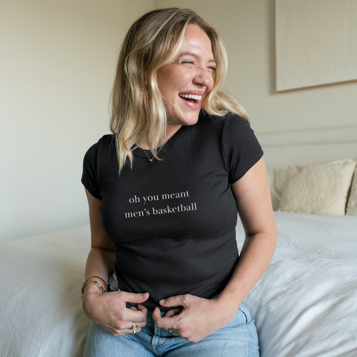 Shirtgeist Oh You Meant Men's Basketball Baby Tee — front view on model