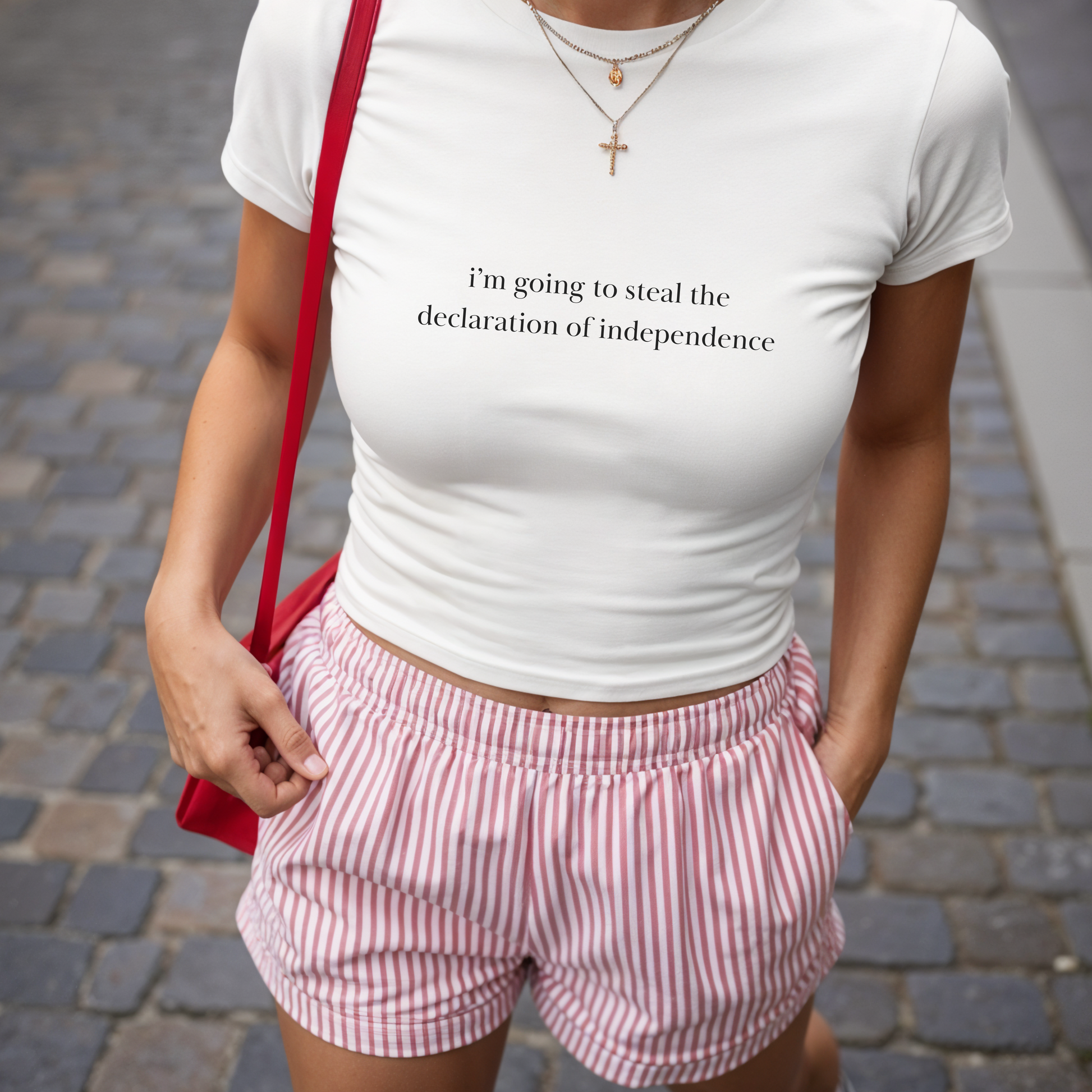 Shirtgeist National Treasure Baby Tee — front view on model